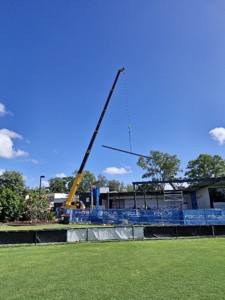 Aspley Hornets roof — crane lifting structural steel