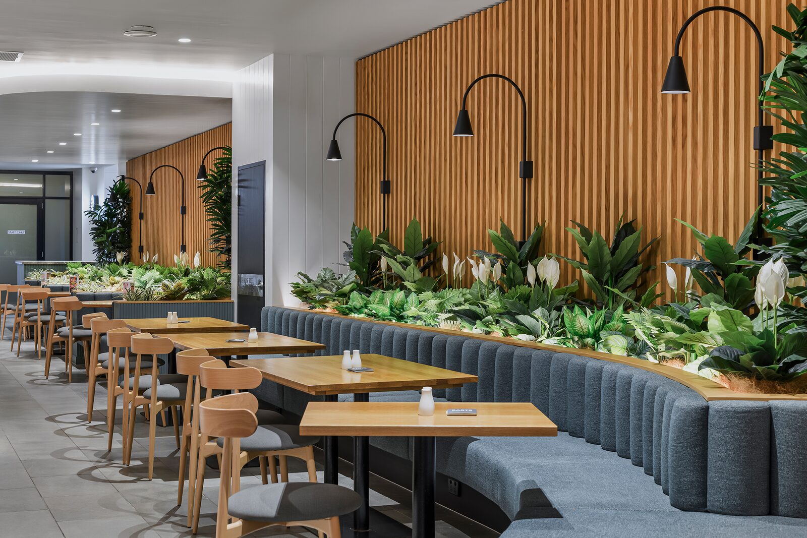Easts Leagues Club — dining booths and planting feature